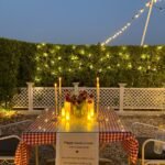 Semi Private Candlelight Dinner in Mohali with candles, fairy lights and romantic table decoration