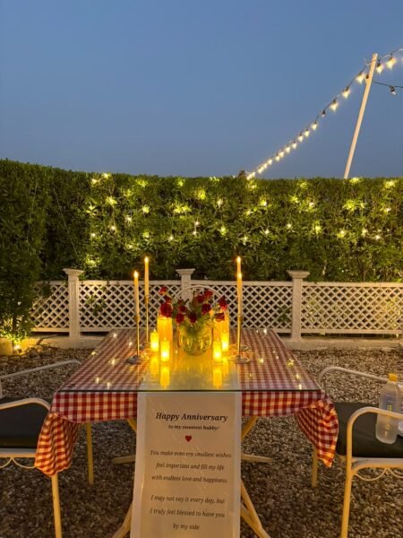 Semi Private Candlelight Dinner in Mohali with candles, fairy lights and romantic table decoration